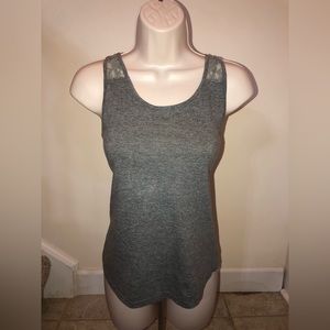 Gray top from I’m in love with DEREK in a size large